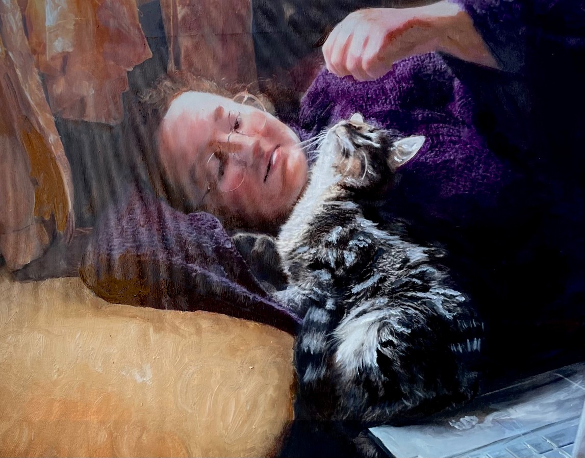 Commissioned oil portrait of a woman resting with her cat