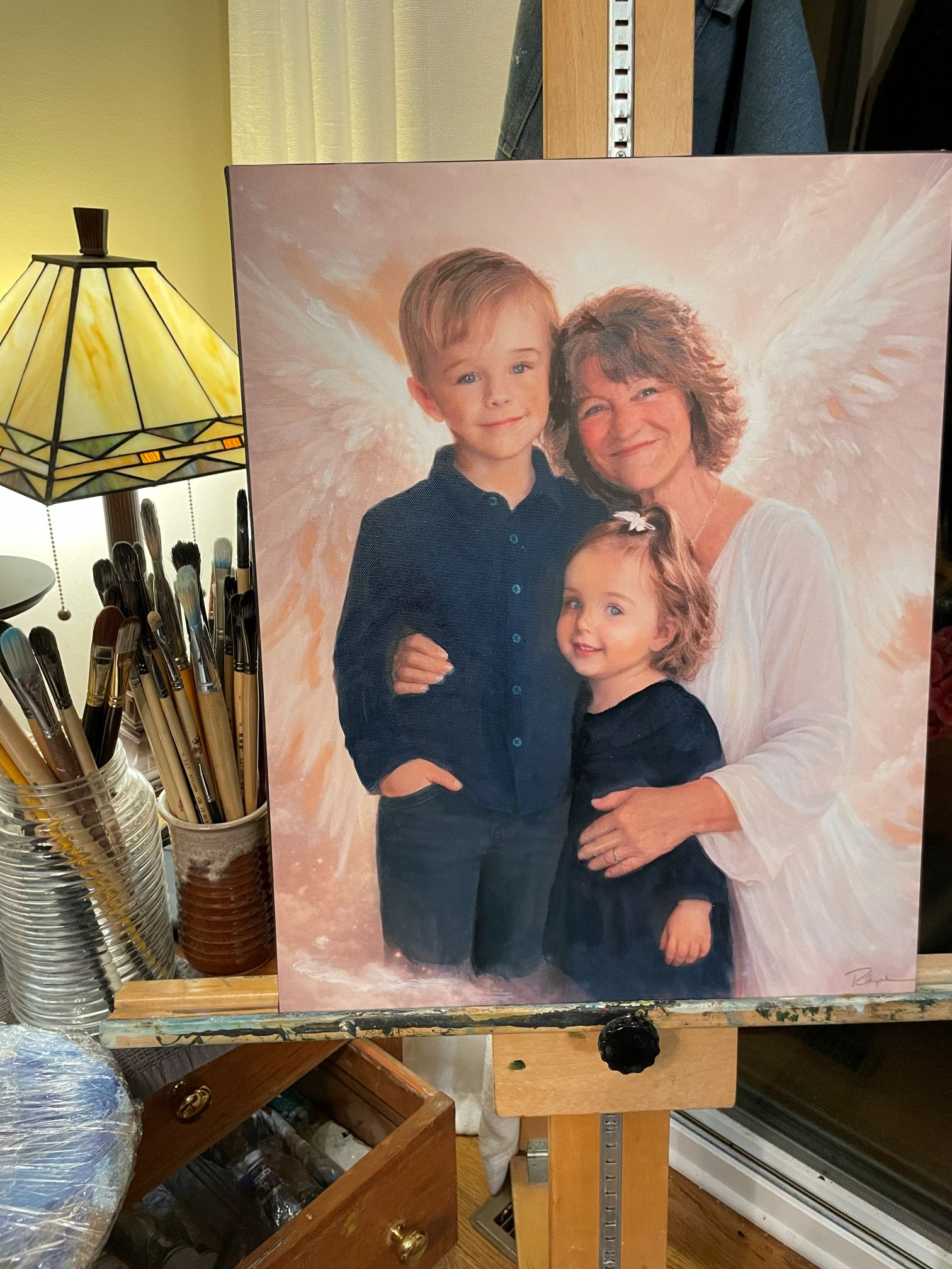 Commissioned memorial portrait of a grandmother with two children